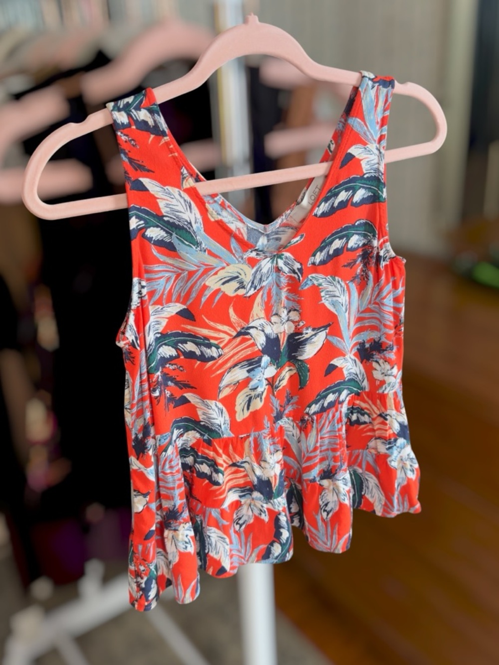 Sleeveless Floral Peplum Top